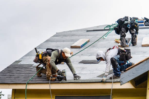 Professional Roofing technician working in Akron, IN